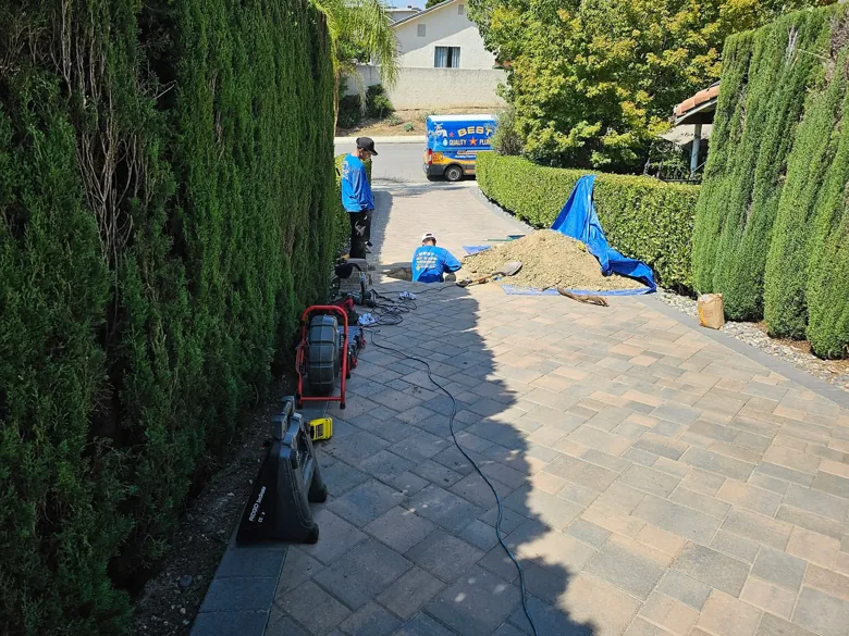 Driveway excavation with crew and service van