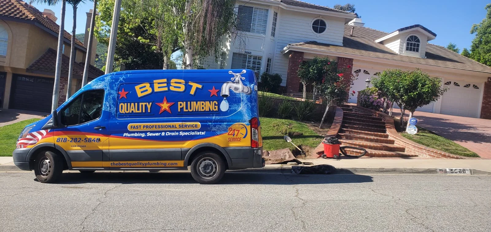 Best Quality Plumbing service van and equipment outside a home